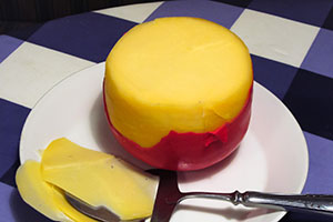 fromage à pâte ferme enrobé de cire